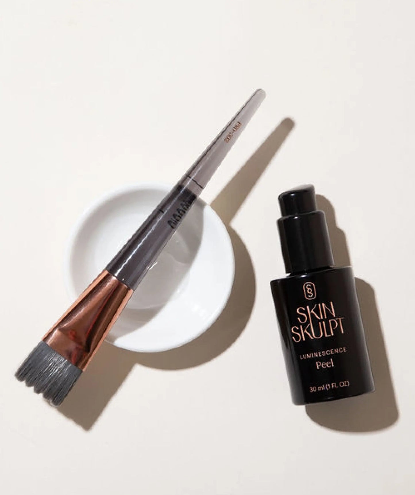 Luminescence Peel applied with a brush for even coverage, from SkinSkulpt